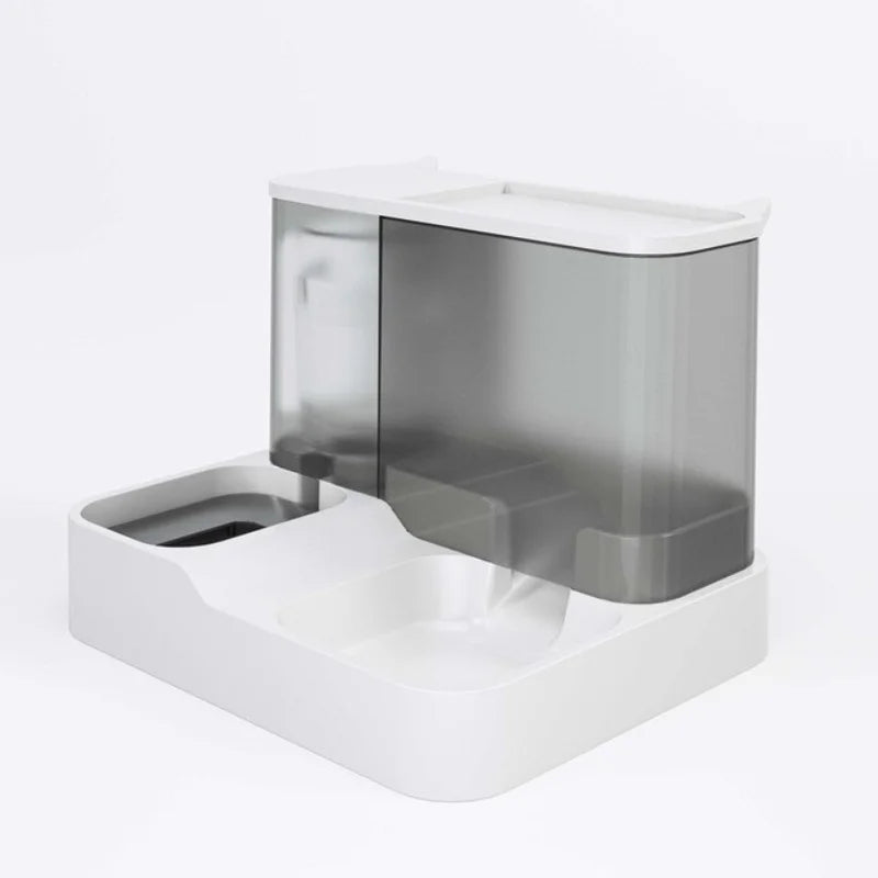 Distributeur de croquettes pour chat avec réserve d'eau intégrée