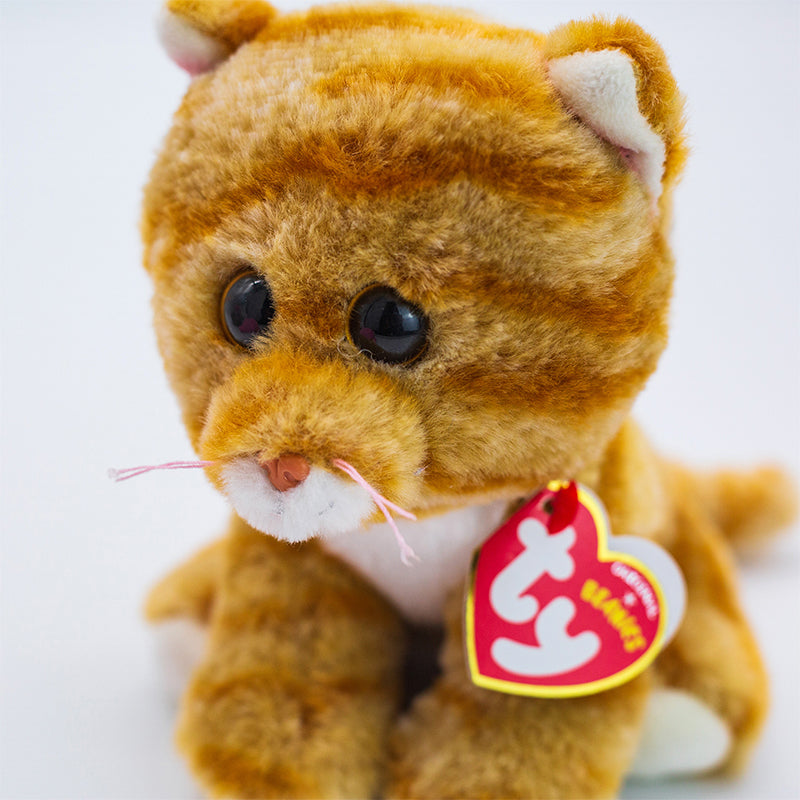Peluche chat roux avec grands yeux