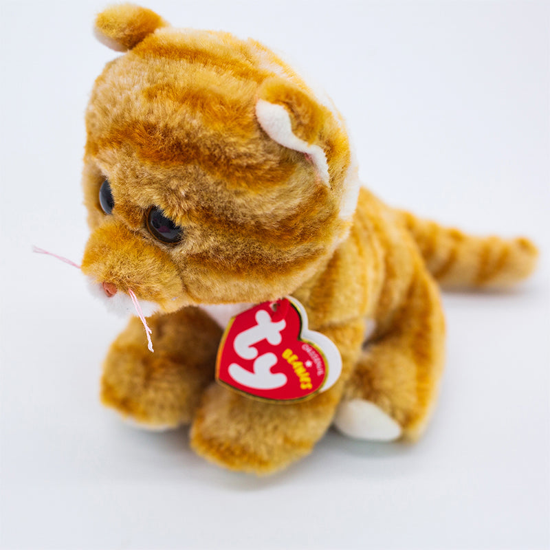 Peluche chat roux avec grands yeux