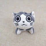 Peluche chat gris assis