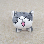 Peluche chat gris assis